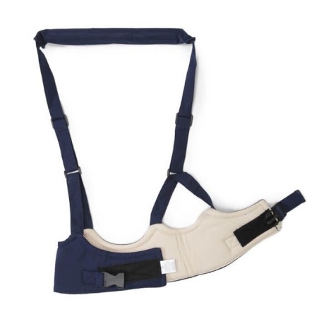 Reverso Arnés Bebé:  1º Cierre de seguridad por velcro del cinturón