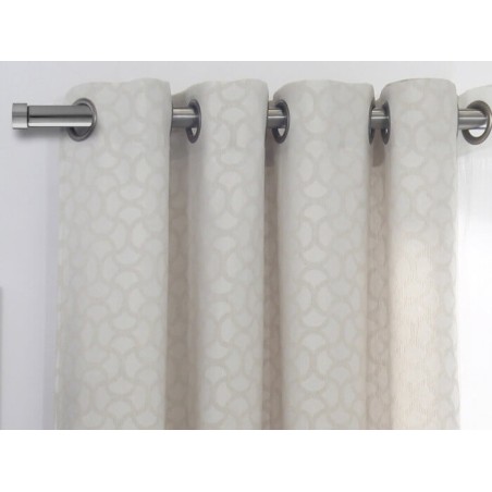 Cortina Jacquard Puigcon Beige confeccionadas con ollaos Reig Marti