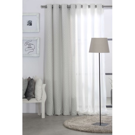 Cortina Jacquard Puigcon Beige confeccionadas con ollaos Reig Marti